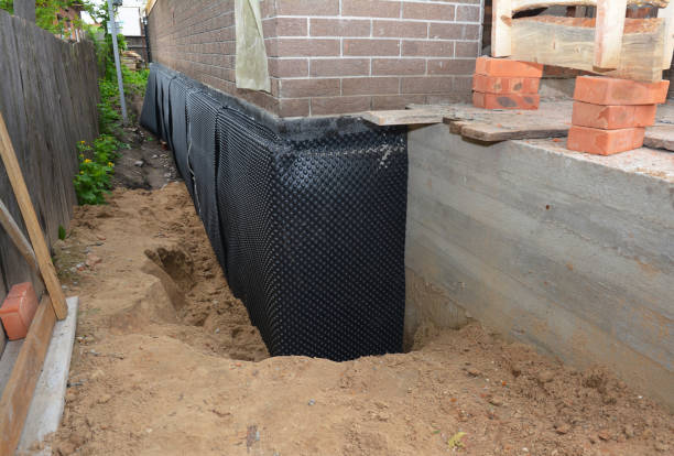 SJ Waterproofing Pros technician performing targeted Waterproofing assessment in Rutledge, GA